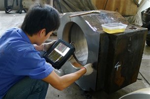 F:5公司照片5.7.28西马克轴承座探伤x.jpg